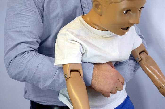 Choking first aid - child chest thrust choking-first-aid-child-chest-thrust